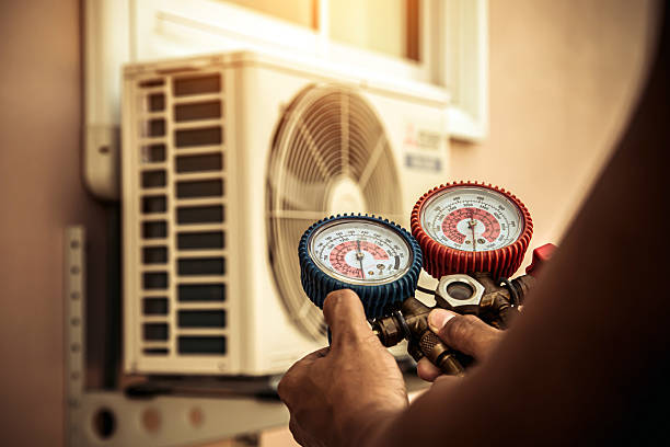 Professional Air Conditioning Service technician working in Shokan, NY